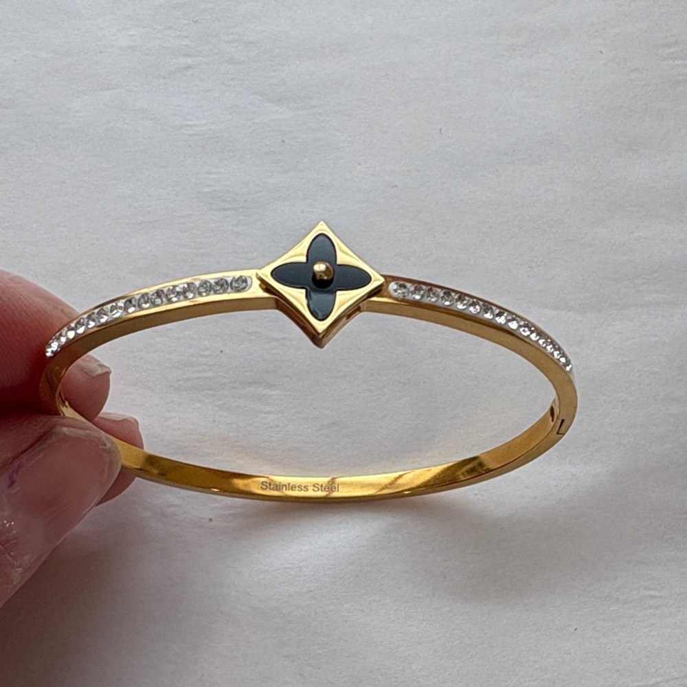Gold-Tone Black Flower Accent Bangle Bracelet with Crystals